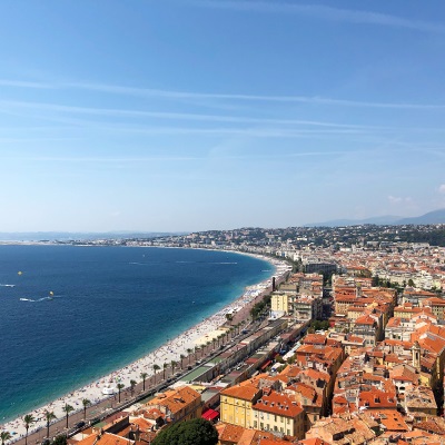 Sunny beaches in the French Riviera, attracting investors looking for luxury properties and seasonal rentals.